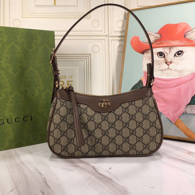 G*u*i top handle bags